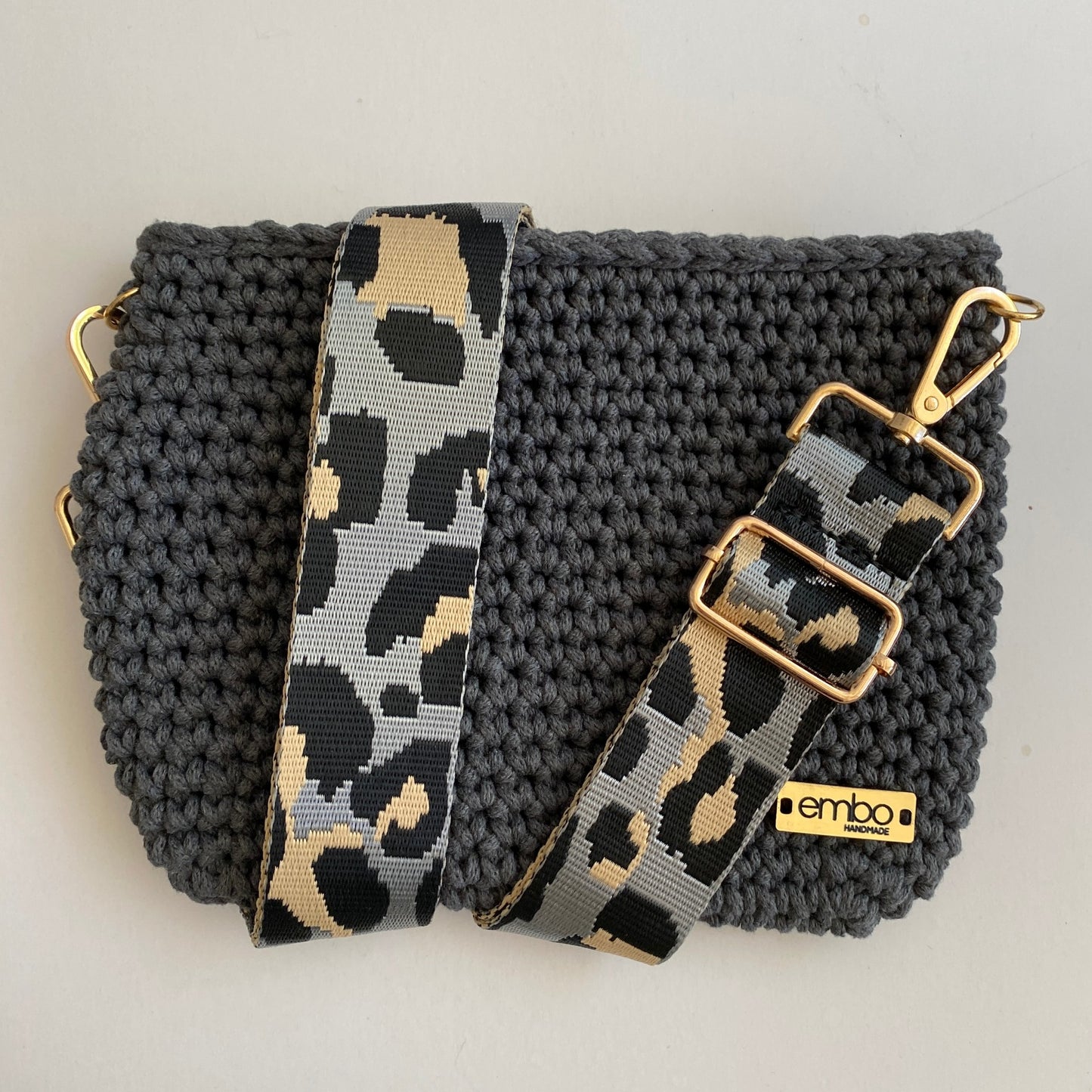 Medium cord bag with woven strap