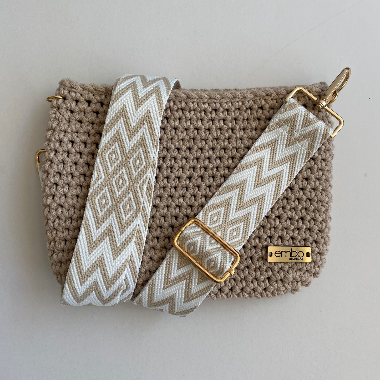 Medium cord bag with woven strap